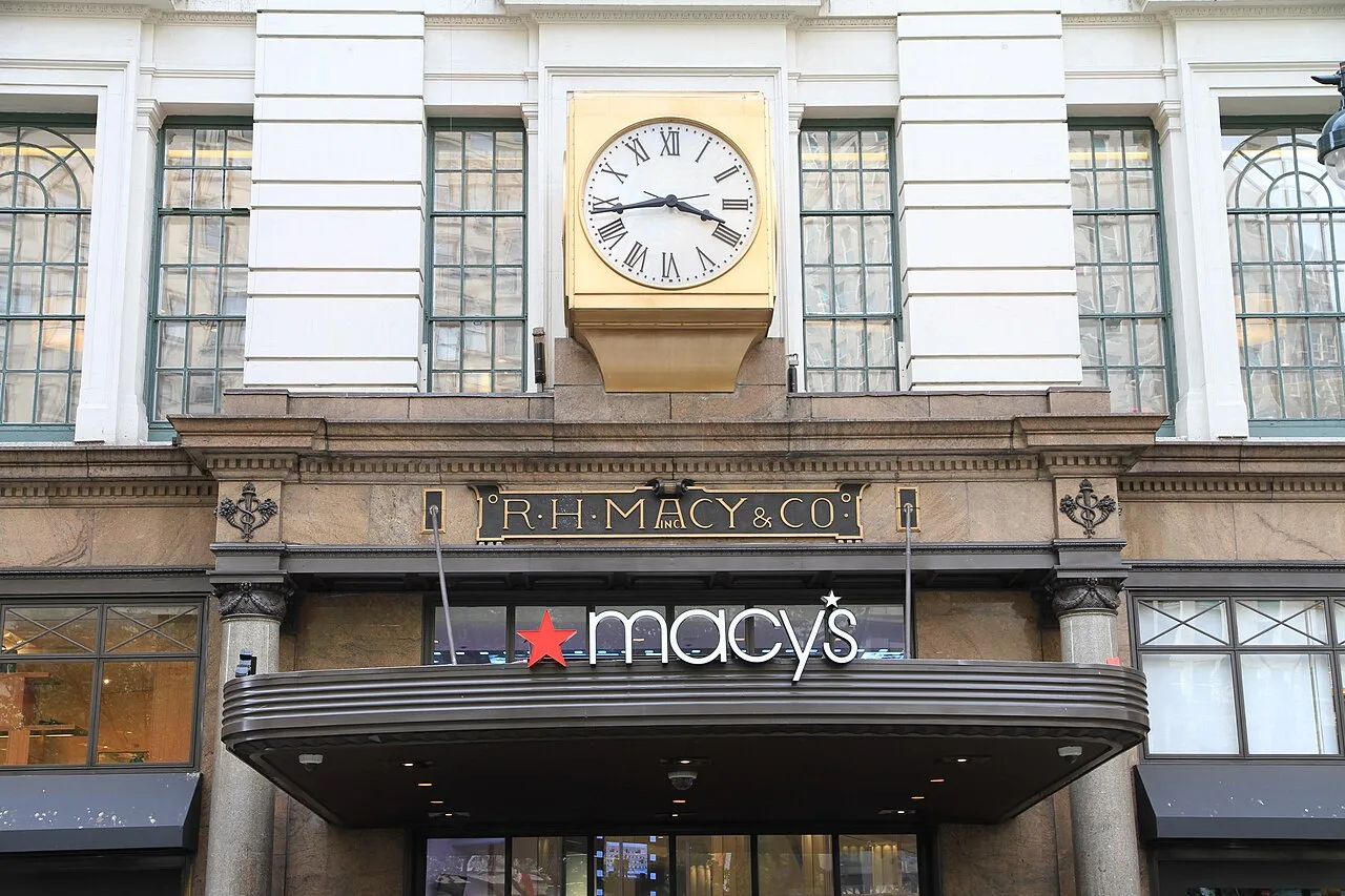 The Macy's entrance at Herald Square in New York: the founder's name R·H·MACY & CO. carved above, the macy's sign below.